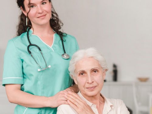 portrait-female-nurse-with-her-senior-patient-sitting-wheel-chair_23-2147861498
